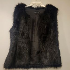 Black faux fur vest